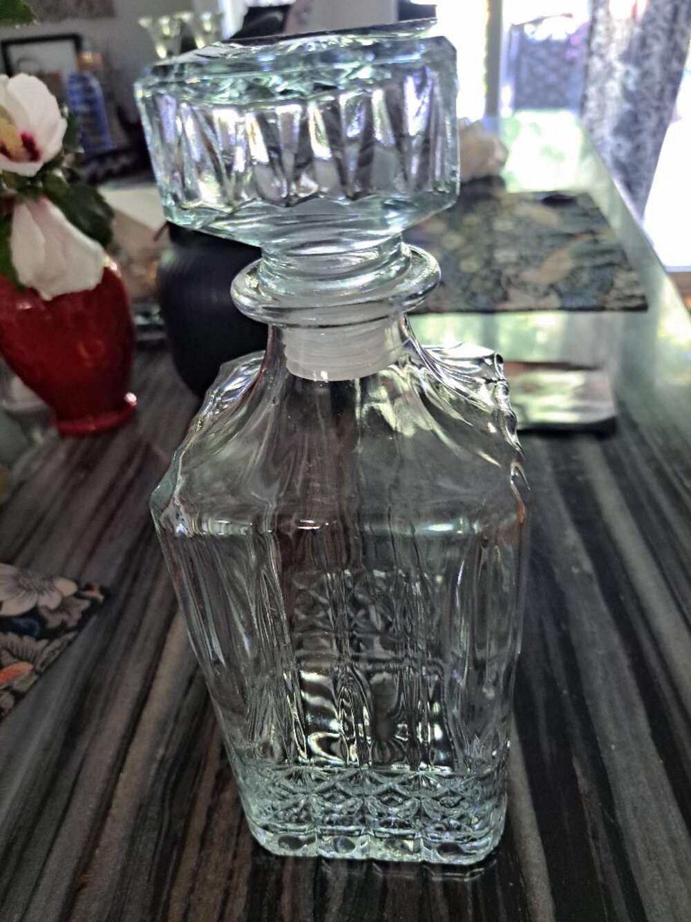 Vintage Waterford decanter with square stopper  Dimensions 4ʺW × 5ʺD × 9.5ʺH S